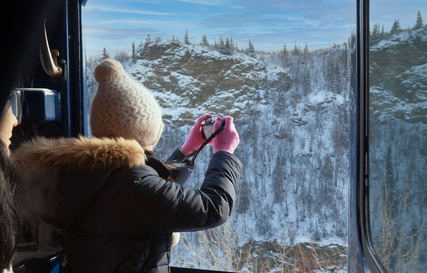 The Denali Star train, winding through the Susitna River gorge near Hurricane, slows down to make each turn.
